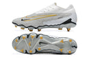 Chuteira Nike Phantom GX Low Elite FG Campo
